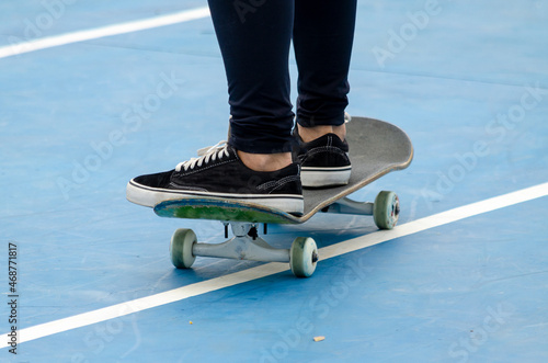legs on skateboard