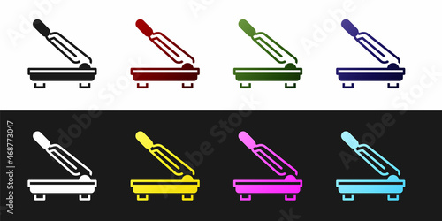 Set Paper cutter icon isolated on black and white background. Vector