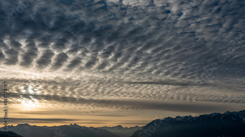 Sunrise over the mountains. Dramatic sky. Lausanne, Switzerland. © Cherry