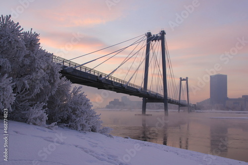 Vinogradovsky bridge over the Yenisei river in winter. Krasnoyarsk.