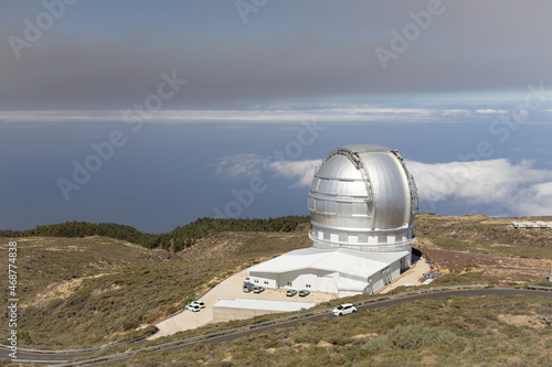 The ash plume (smoke, fume) from volcanic eruption above Gran Telescopio Canarias, Roque de los Muchachos Observatory (ORM) on La Palma, Canary Islands, Spain. photo