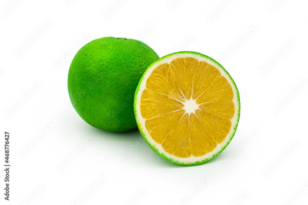 Sliced and whole sweet lemon isolated on white Sliced and whole sweet lemon isolated on white