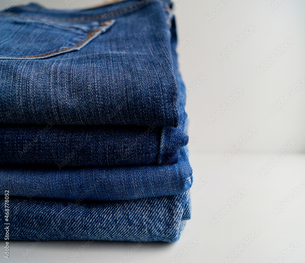 stack of blue jeans stack of blue jeans
