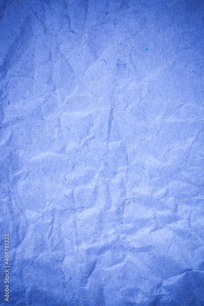 Naklejka premium Recycling blue paper crumpled background.