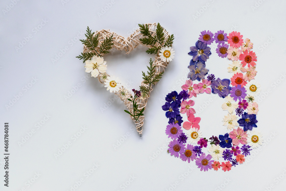 International Women's Day (March 8) is a holiday that is celebrated annually on March 8 in a number of countries around the world. Dry flowers. Copy space.