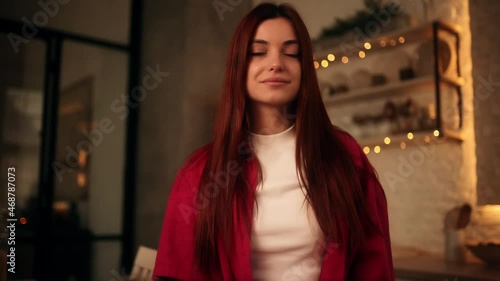 Wallpaper Mural Close up face of smiling young attractive woman looking at camera alone at home in kitchen. Happy beautiful housewife in indoors. High quality 4k footage Torontodigital.ca