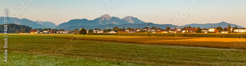 Beautiful alpine summer morning view with the alps in the background near Freilassing, Bavaria, Germany