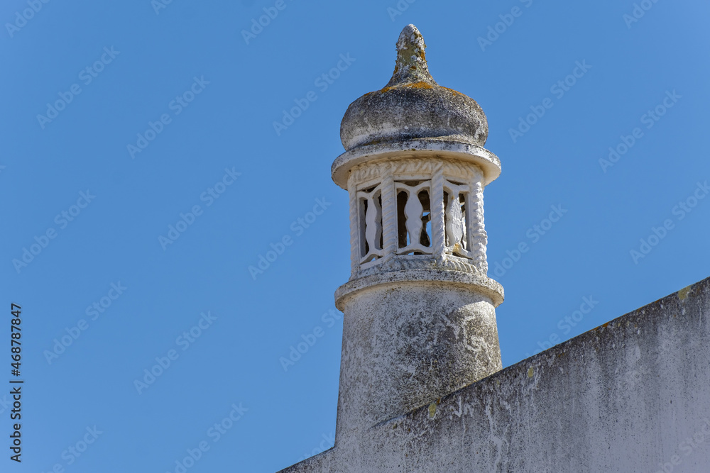 Close view of a traditional algarvian chimney on the city of Estoi in Faro district, Algarve, Portugal