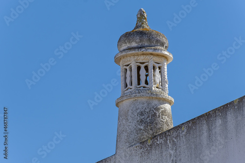 Close view of a traditional algarvian chimney on the city of Estoi in Faro district, Algarve, Portugal