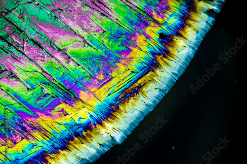 Colorful crystals under microscope, polarization colors, polar filters