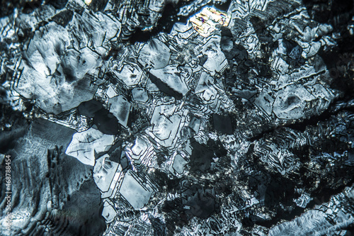 Colorful crystals under microscope, polarization colors, polar filters