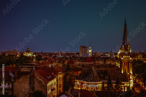 view of the city Arad at night, buildings and chapel