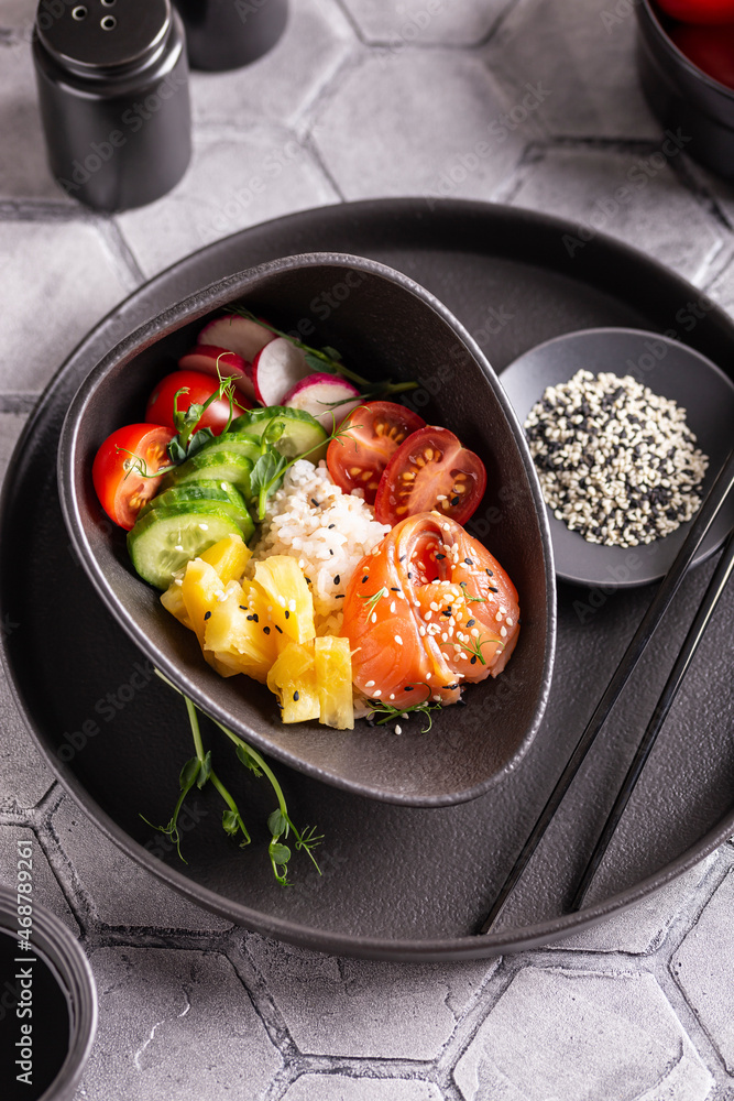 Dinner with fresh poke salad with salmon Dinner with fresh poke salad with salmon