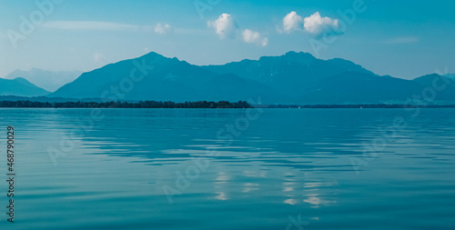 Beautiful alpine summer view with reflections at the famous Chiemsee, Bavaria, Germany
