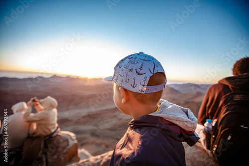 little boy traveler on Mount Sinai in Egypt.