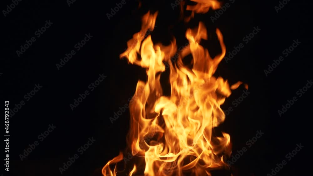 flames of fire on a black background in hell. hot fire burns hot. energy flammable concept. warm spark of fire fire hazard light gasoline effect