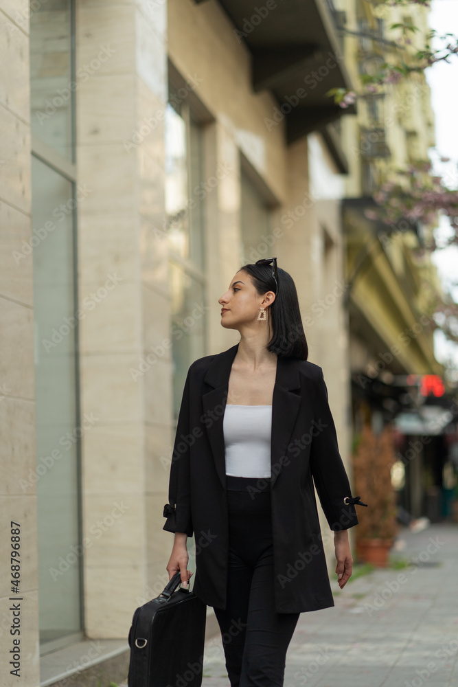Walking towards the company while thinking Walking towards the company while thinking