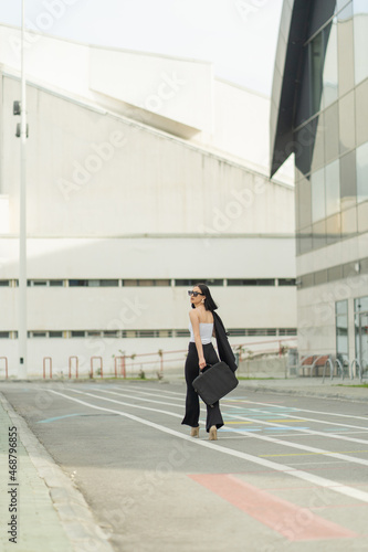 Businesswoman walking fast