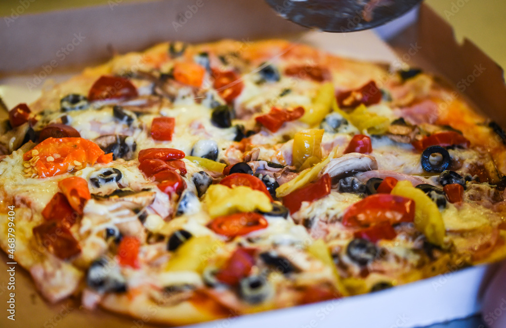 close up view of the italian home made pizza dish close up view of the italian home made pizza dish