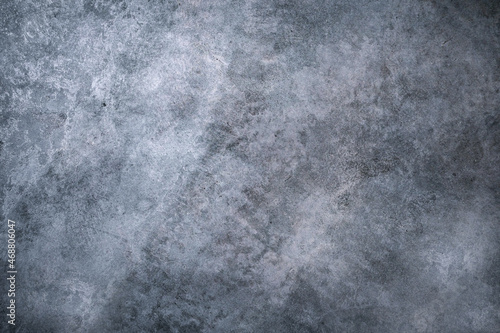 Abstract empty backdrop for copy space. Cement textured gray wall background with grainy surface. There is blank place for your text. 