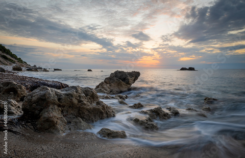 Long exposure capture of a beach sunset.