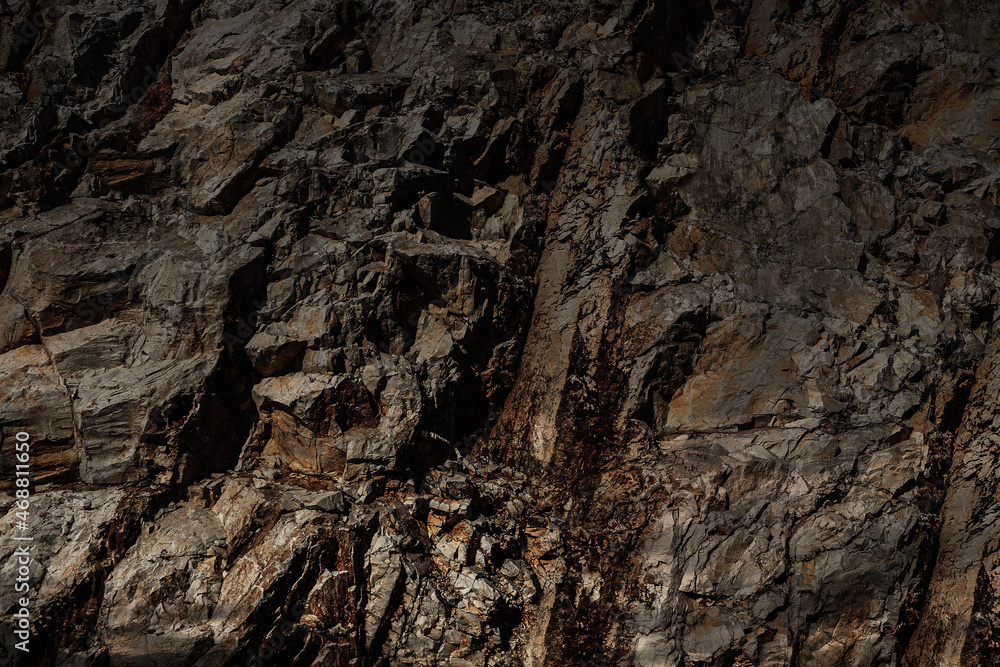 Mystic grim mountain rock prison. Fogy spooky fortress in dark alley. Old cragged creepy mythical cliff. Vintage fearful crannied horrible stone. Damaged terrible karst cavern for crime mystery drama