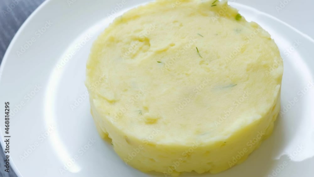 Mashed potatoes on a plate in a restaurant ready for lunch Mashed potatoes on a plate in a restaurant ready for lunch