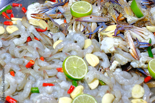 Fresh prawns and blue crabs that are about to be cooked.
