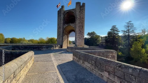 Historic site of Besalú in La Garrocha Girona medieval town pon fortified wall bridge over the river, point of tourist interest