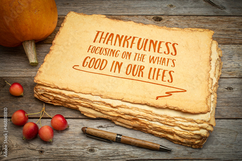 thankfulness - focusing on the what's good in our life, Thanksgiving and positivity theme, handwriting on a rough handmade paper with pumpkin and crab apples