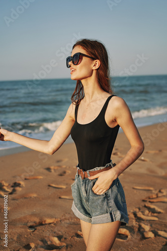 pretty woman on the beach summer vacation lifestyle sun