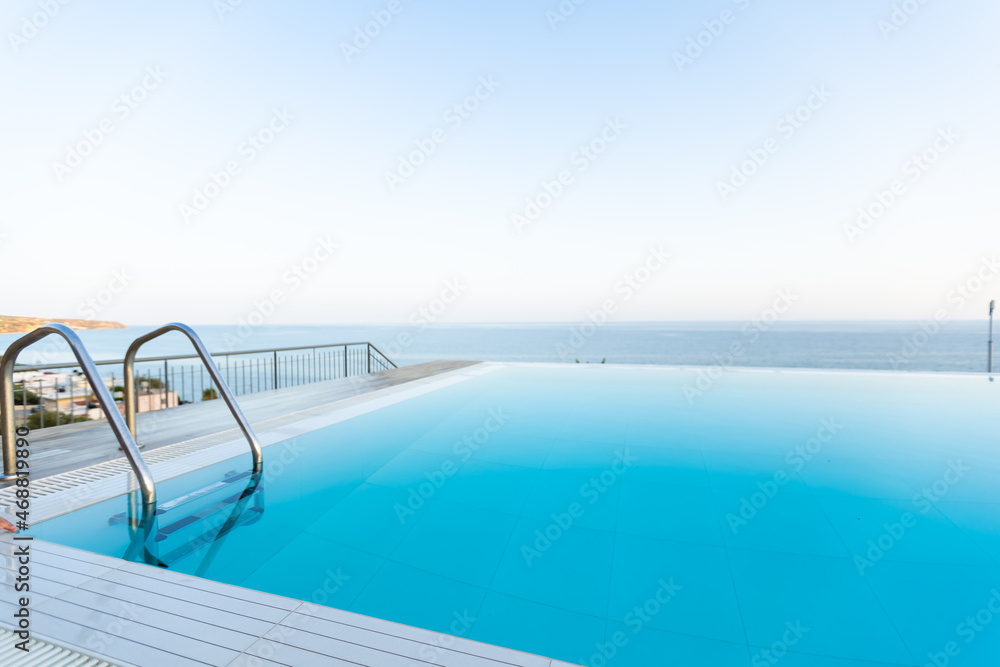 Swimming pool on top of roof deck building.