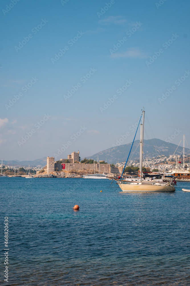 Seascape and natural background. The bay of the old town with yachts and boats in the sea.