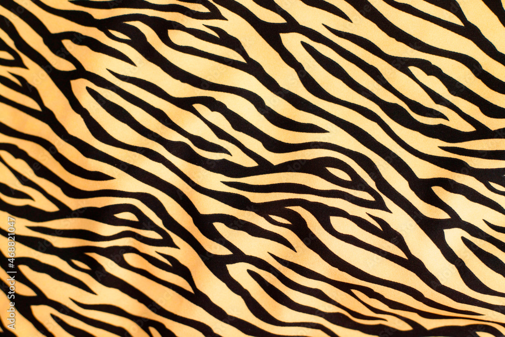 Close up shot of tiger print fabric Close up shot of tiger print fabric