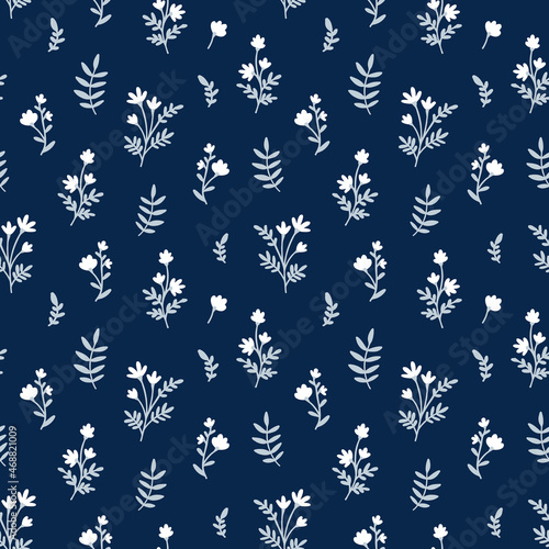 Tiny Wildflower Floral Seamless Pattern. White Meadow Flowers with leaves on navy blue background. Vintage Ditsy style motif. Vector texture for fashion, nursery print, textile, wrapping paper, cover