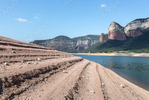 Sau reservoir and Las Guillerias mountain range with the submerged bell tower of San Roman de Sau village, Barcelona photo