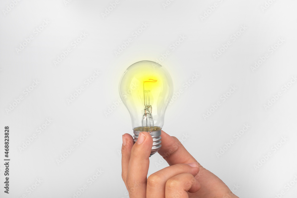 Decision making concept. New idea. Light bulb in the hands of a man. Decision making concept. New idea. Light bulb in the hands of a man.