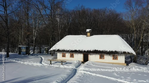 Wallpaper Mural Christmas or New Year holidays. traditional village landscape on a clear winter day. Houses and fields covered with snow. Torontodigital.ca
