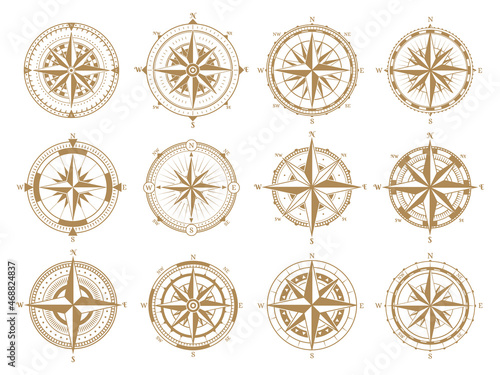 Retro old nautical navigation rose wind compass. Vintage rose wind marine navigation measure compasses vector illustration symbols set. Antique navigation skipper compasses photo
