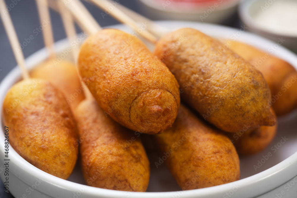 Stack of Corn dogs cooked with sausage and dough, - obrazy, fototapety, plakaty 