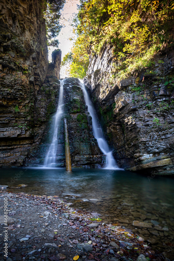 Fototapeta premium Beautiful waterfall among the canyon in the Carpathian mountains.