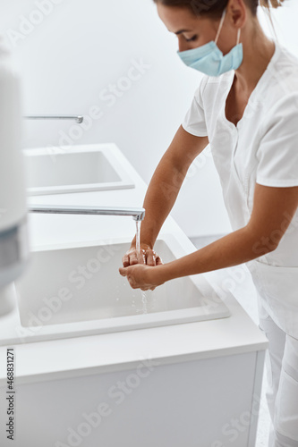 Doctor washes his hands, disinfect Their hands before surgeryne Concept of fight against coronavirus