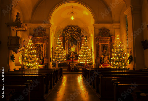 Canvas Interior of a church with Christmas decorations