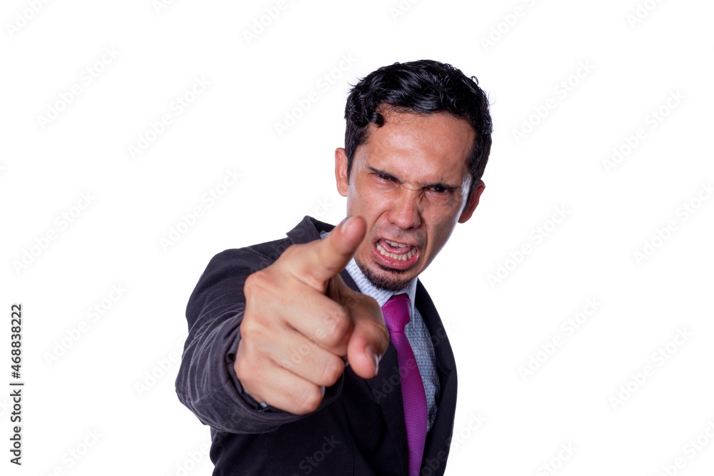 Very angry businessman boss scolding, shouting and pointing at the camera. Concept of an abusive and unpleasant boss. Angry man pointing index finger and shouting isolated on all white background. Very angry businessman boss scolding, shouting and pointing at the camera. Concept of an abusive and unpleasant boss. Angry man pointing index finger and shouting isolated on all white background.