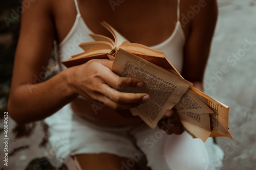 Broken book and tear pages