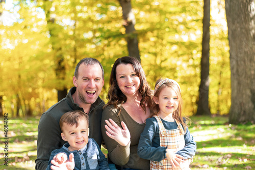 Happy young family in fall