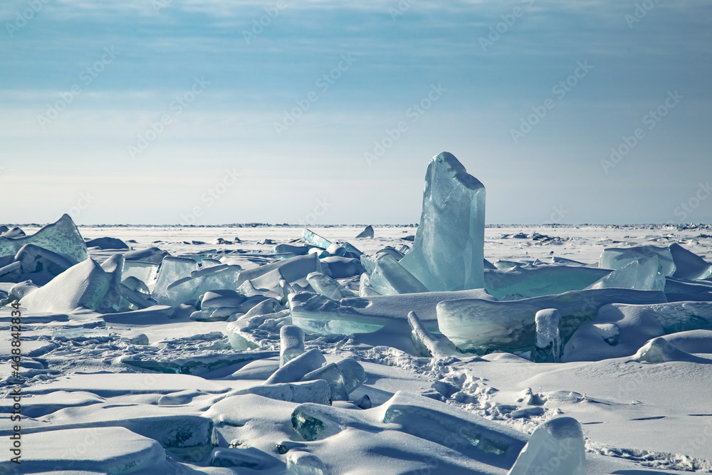 natural background,winter landscape,large blocks of ice with clear blue snow