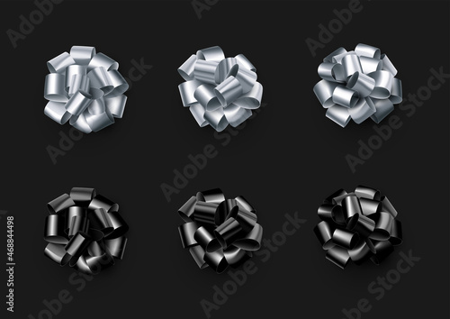 Set of beautiful silver and black foil isolated bows.