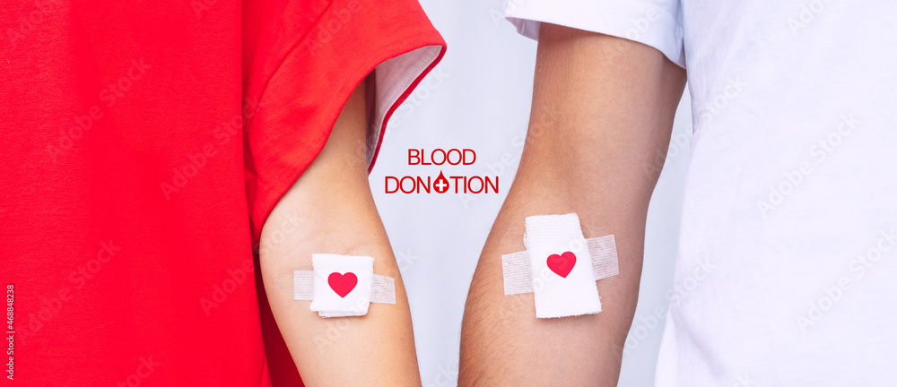 Blood donors with bandage after giving blood. Blood donation, save lives.  World blood donor day concept Stock-Foto | Adobe Stock