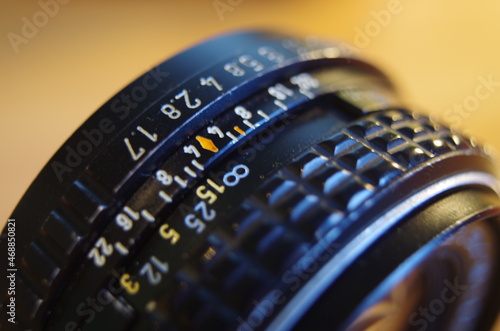 vintage camera lens close up with numbers